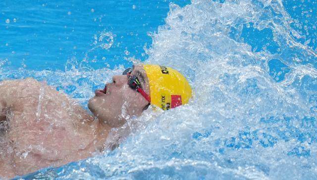 新球体育网页版-脸色惨白步伐略显沉重 混采区的徐嘉余令人心疼